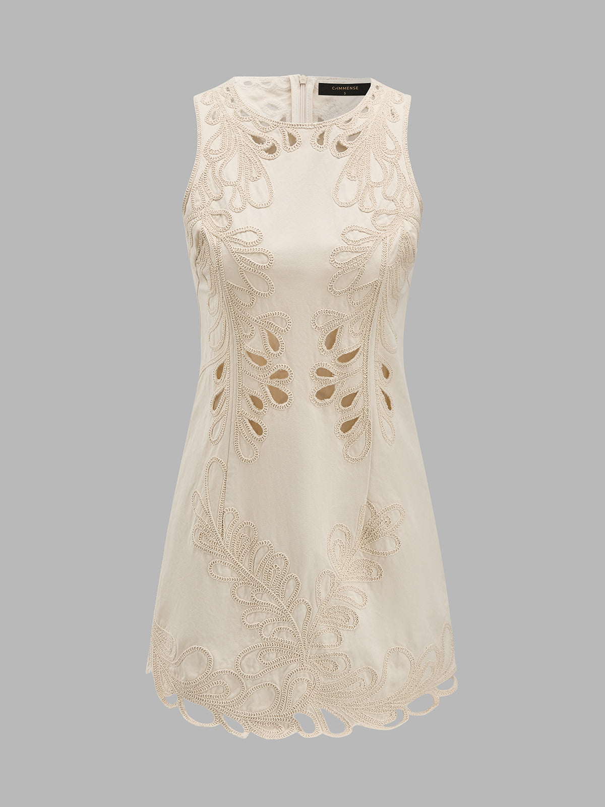 Vestido mini sin mangas bordado con aberturas
